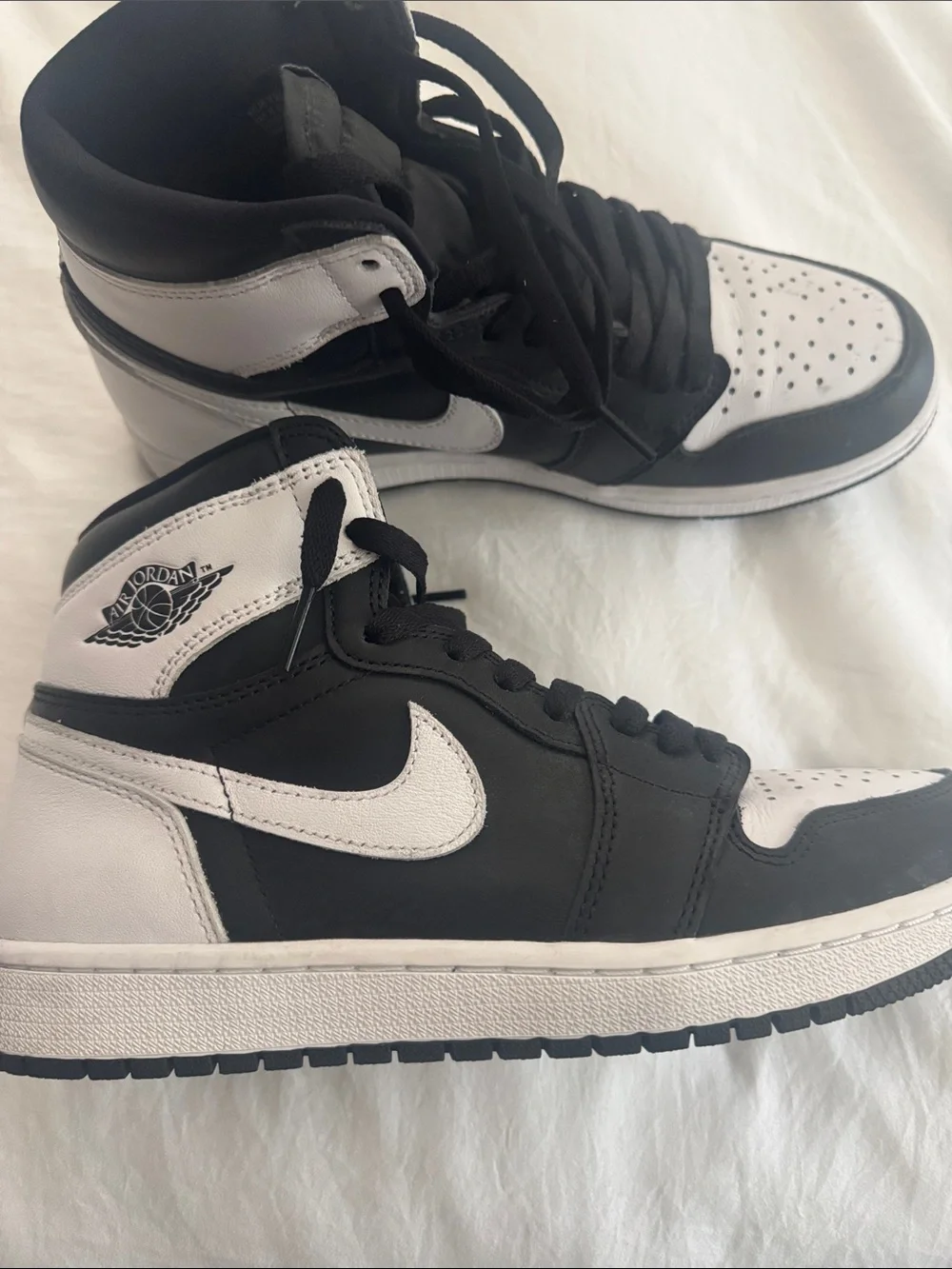 Jordan Black and White High-Top Sneakers